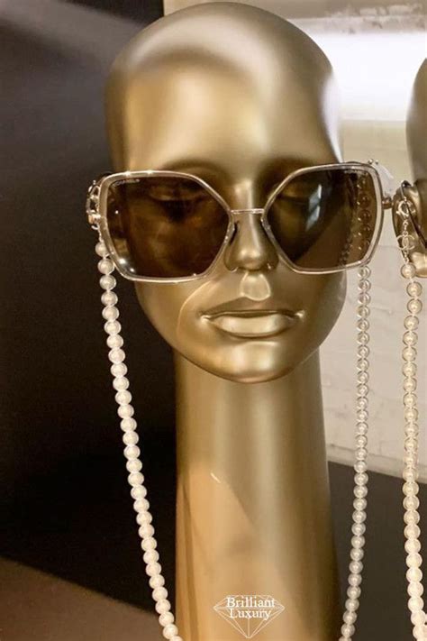 chanel glasses with pearl chain.